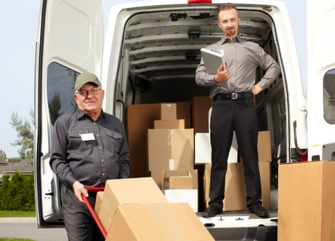 Removalists helping with a house move in Kilburn