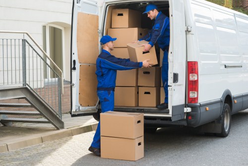 Unpacking boxes and arranging rooms after a Kilburn relocation