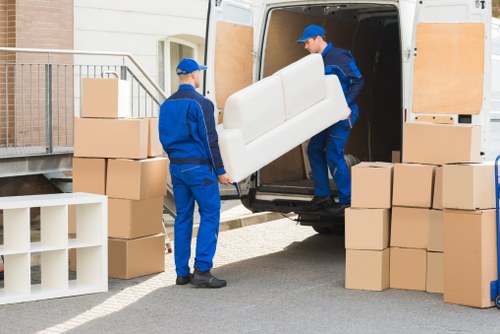 Office removals team preparing desks and boxes in Kilburn