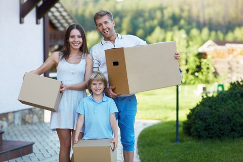 Family home relocation preparation in Kilburn with labelled boxes