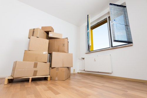 Careful wrapping and boxing of household items during a local move