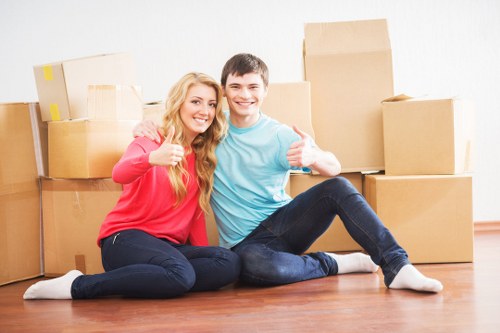 Local removal company loading boxes and furniture in North West London