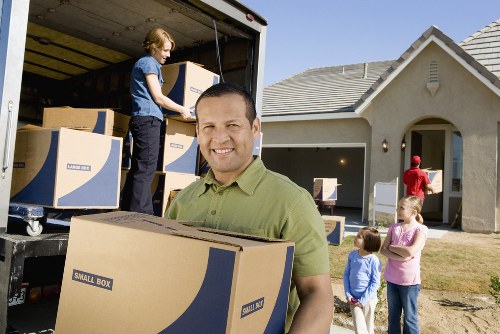 Local movers handling workplace relocation items in Kilburn