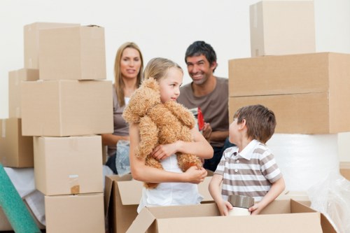 Careful handling of furniture during a home move in Kilburn
